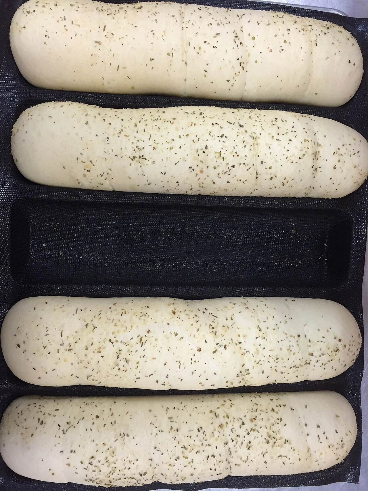 Dough illustrates the pastry-making element of sembusek; this is not the finished dish.
