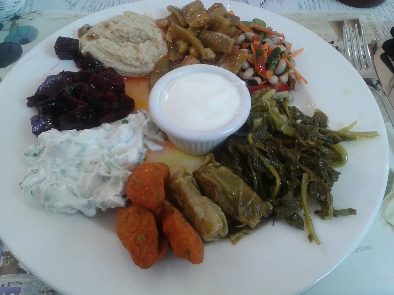 A cold meze platter, one example of contemporary service.