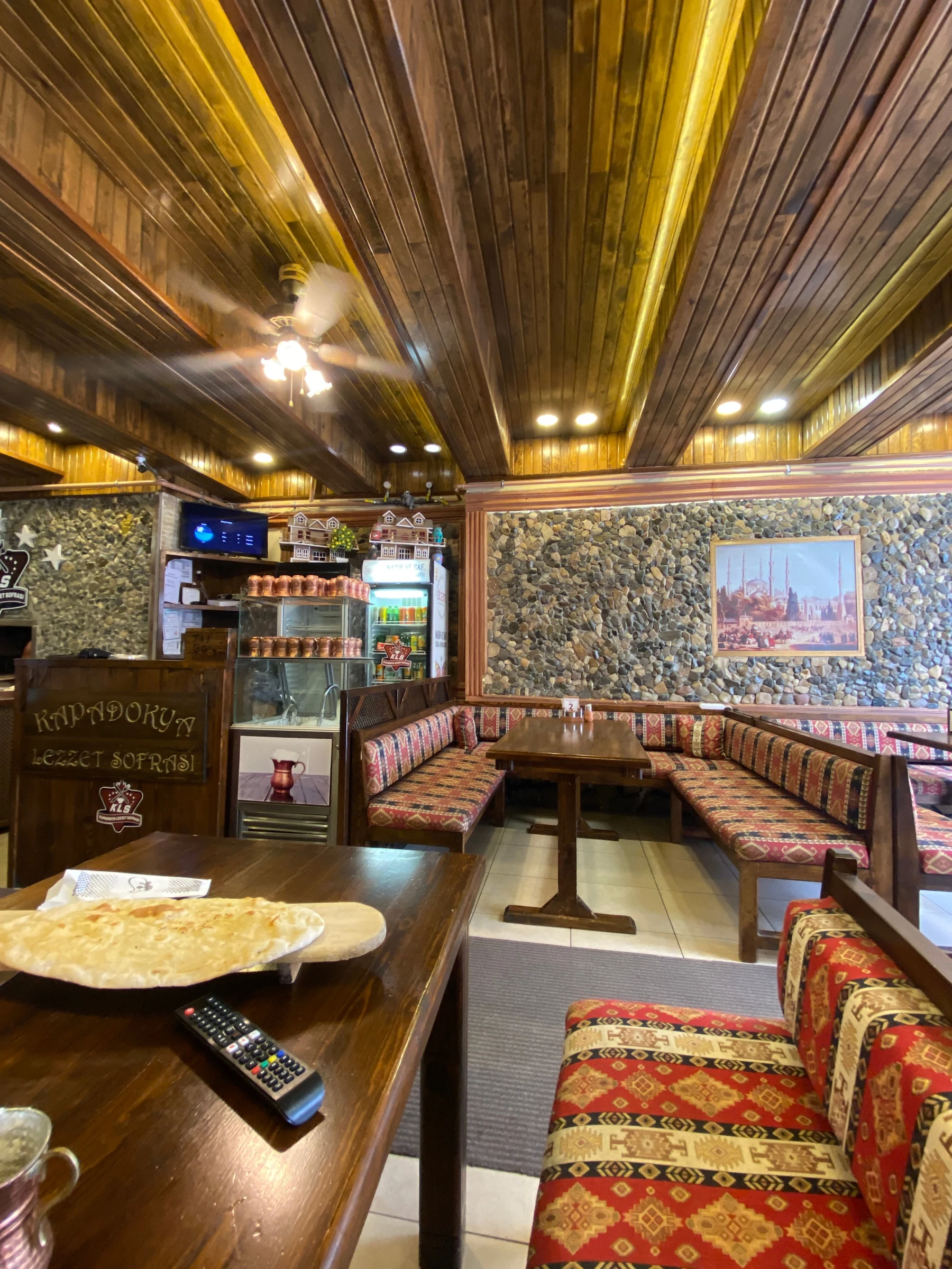 Wood-lined dining room at Kapadokya Lezzet Sofrası in Avanos