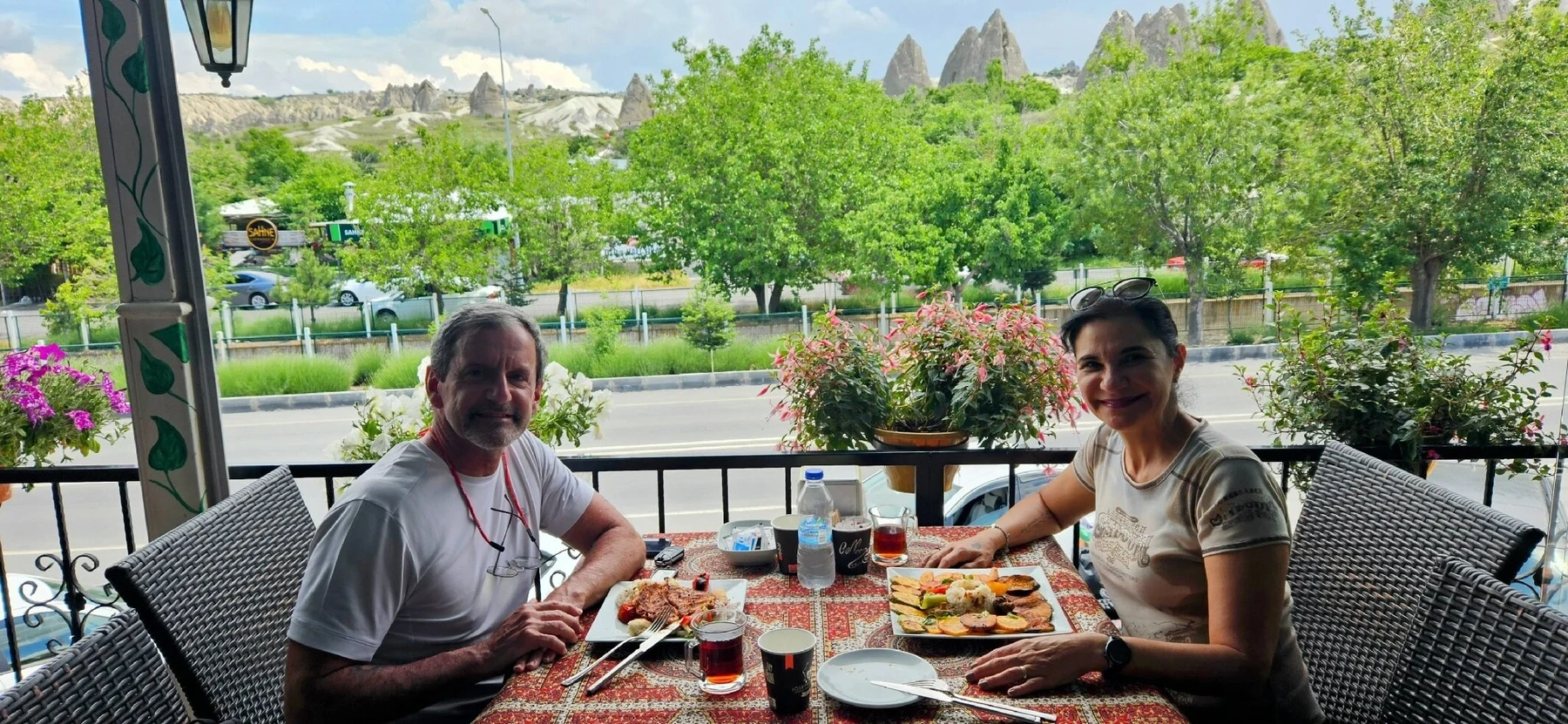 Guests at the restaurant terrace with Göreme views at CanCan Cafe Restaurant, Göreme