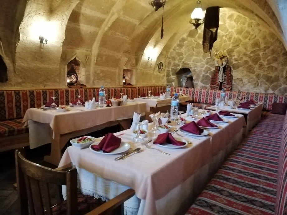 Bizim Ev Restaurant — Stone dining room in Avanos