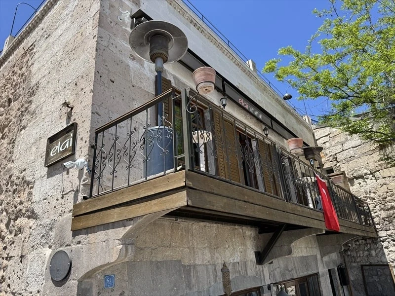 Stone facade and restaurant balcony at Elai Restaurant, Uçhisar