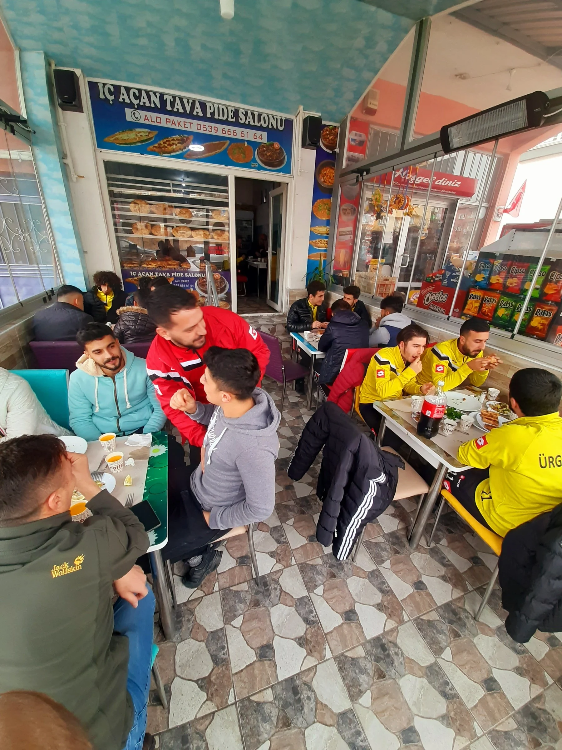 Restaurant entrance and outdoor seating at İçaçan Tava & Pide Salonu, Nevşehir
