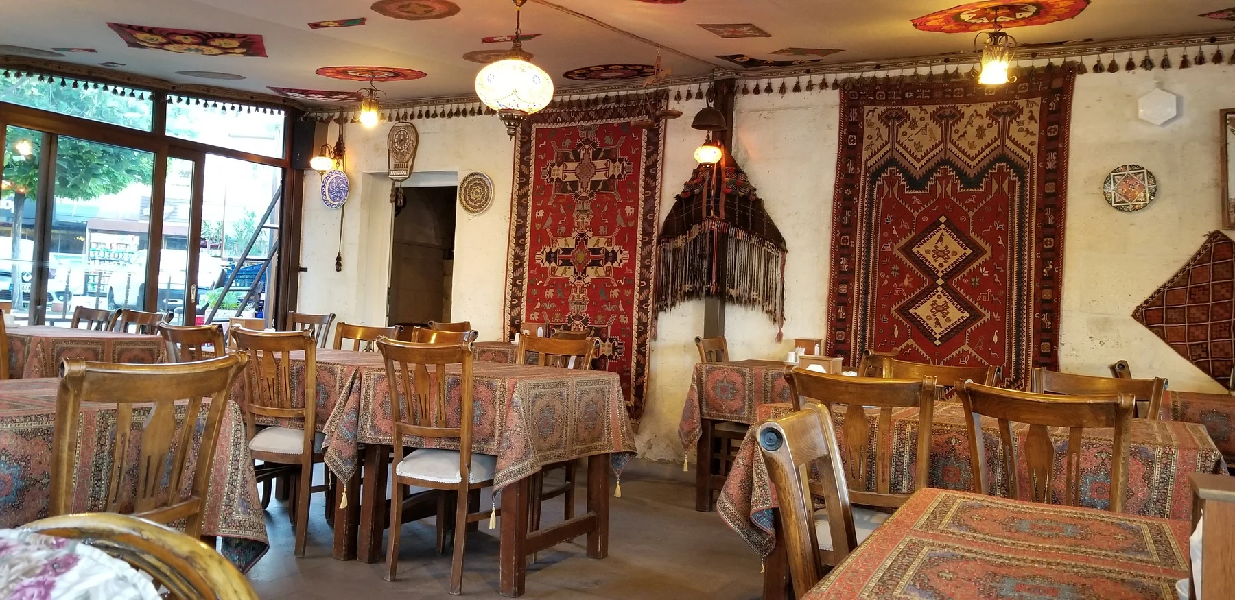 Anatolian Kitchen in Göreme — traditional dining room with woven textiles