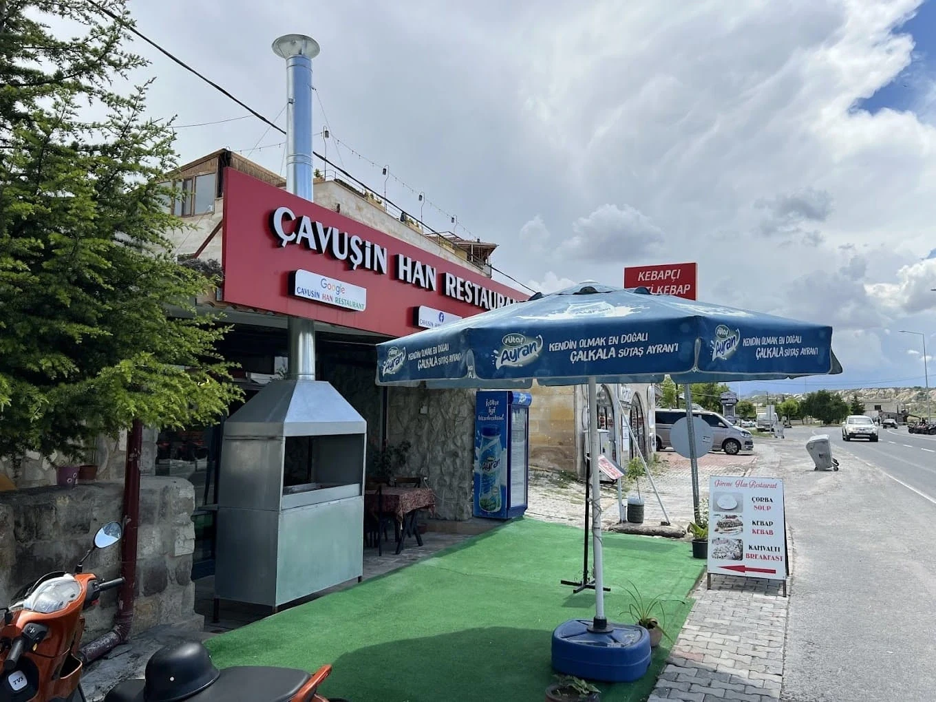 Cavusin Han Restaurant in Çavuşin — restaurant entrance and outdoor seating