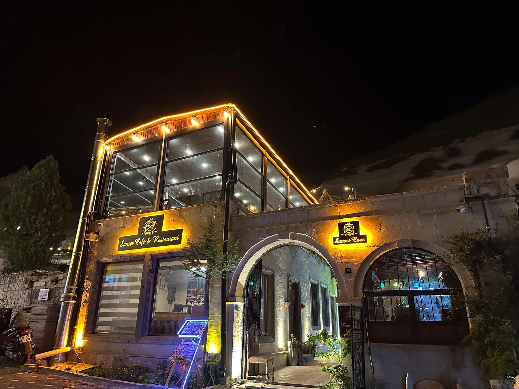 Sunset Cafe Restaurant exterior at night in Göreme