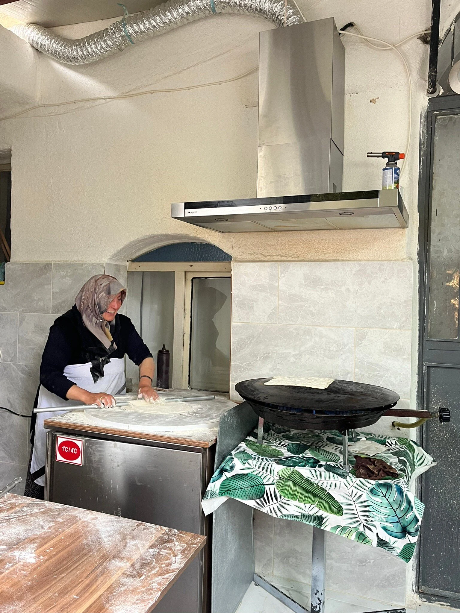 Traditional flatbread preparation at Taste Of Moms in Göreme