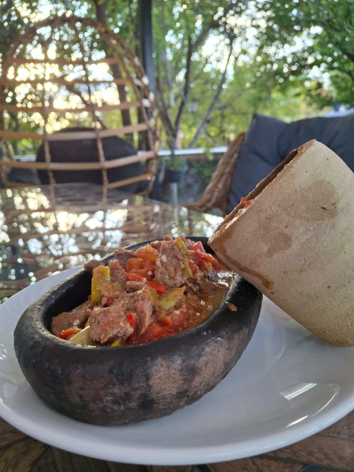 A meal served beside the garden seating at Avanova Cafe Restaurant in Avanos