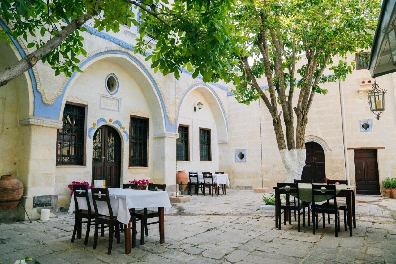 Courtyard dining tables at Gul Konaklari, Mustafapaşa