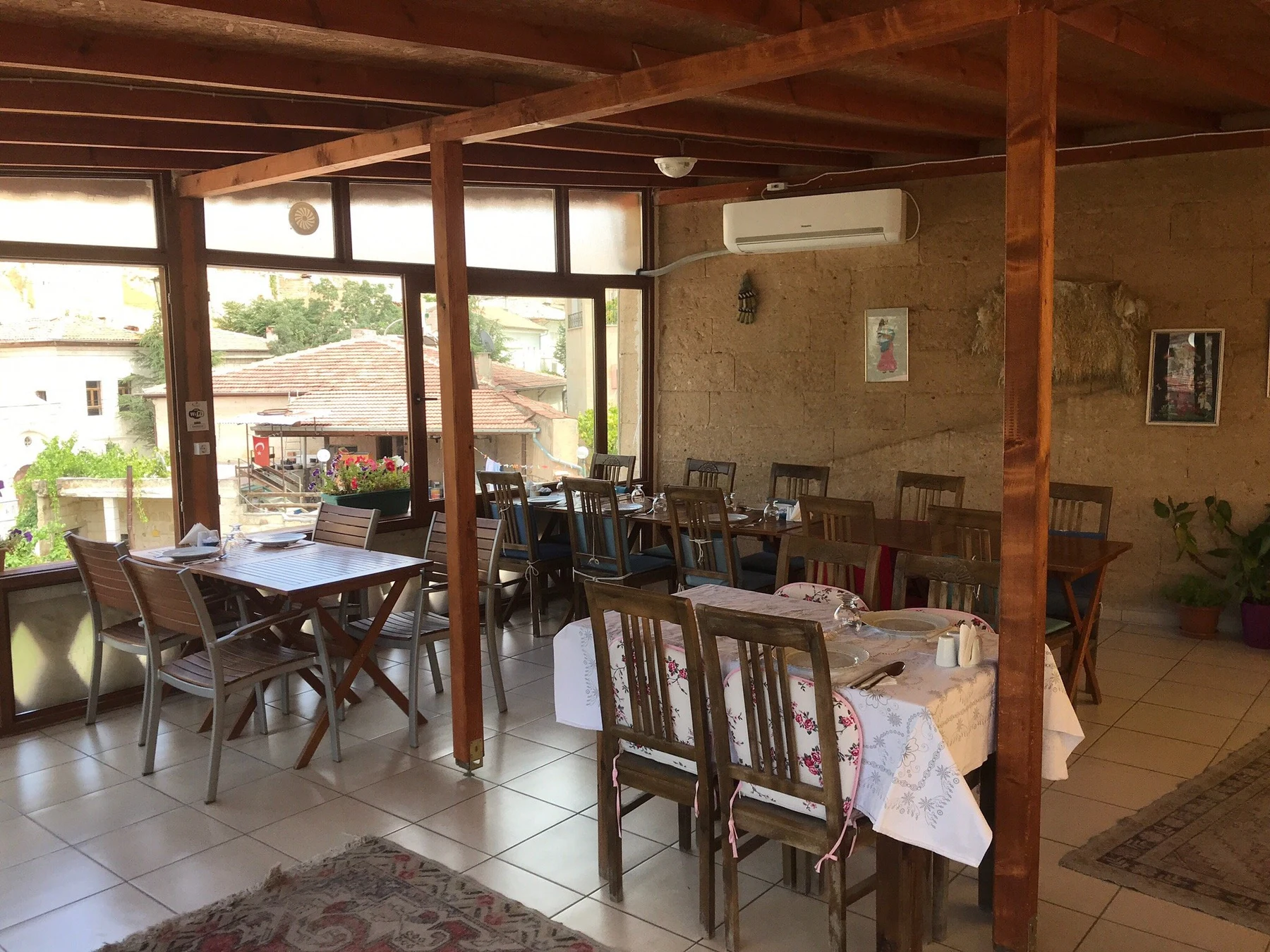Window-lined dining room at Hanimeli Cappadocia in Mustafapaşa