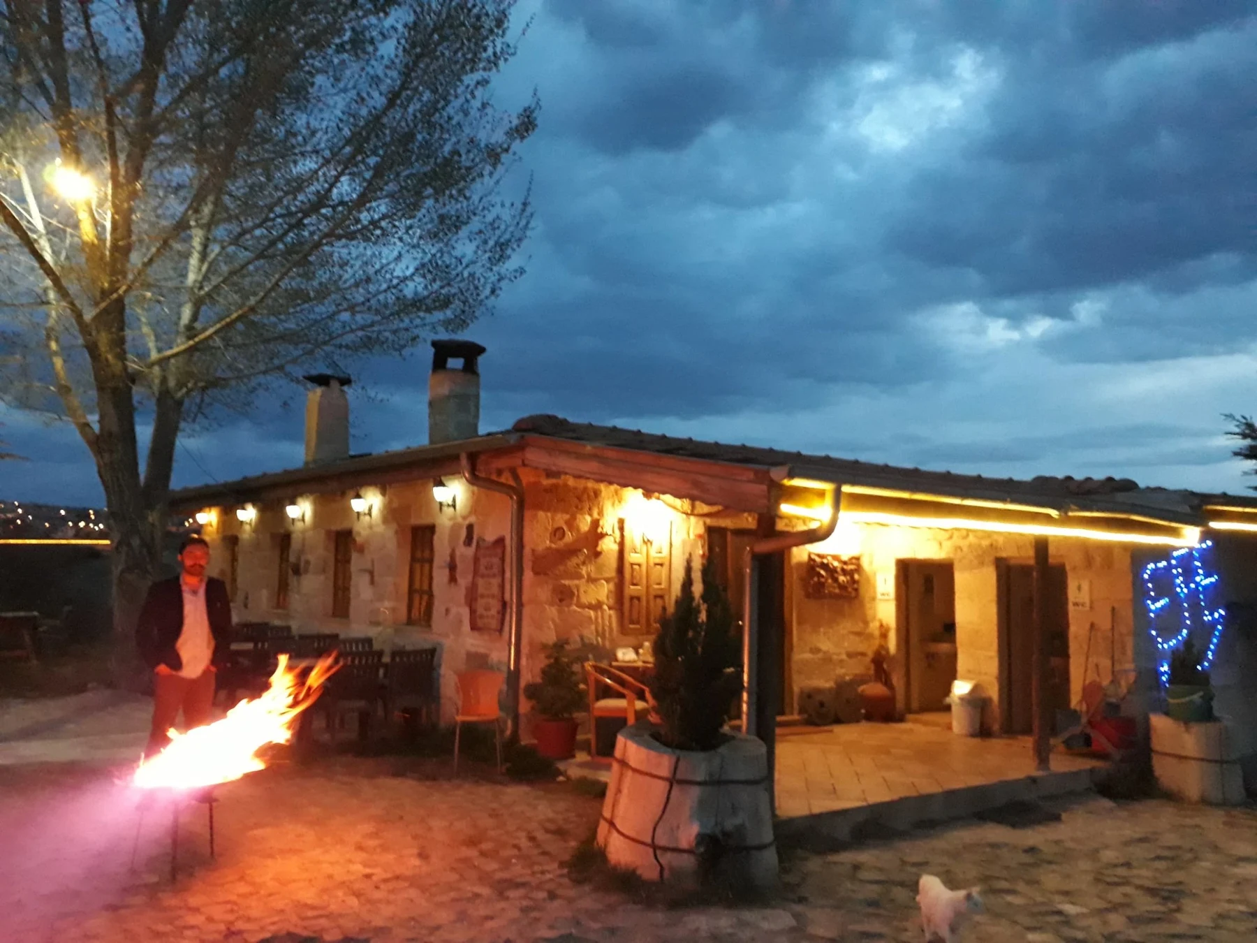 Restaurant garden at dusk at Efe Restaurant Et Evi, Mustafapaşa